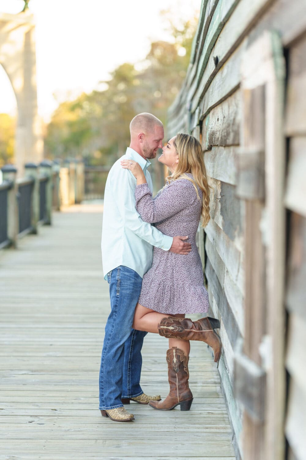 Engagement portraits for my friends from Crossfit with cowboy boots by the Waccamaw River - Conway River Walk