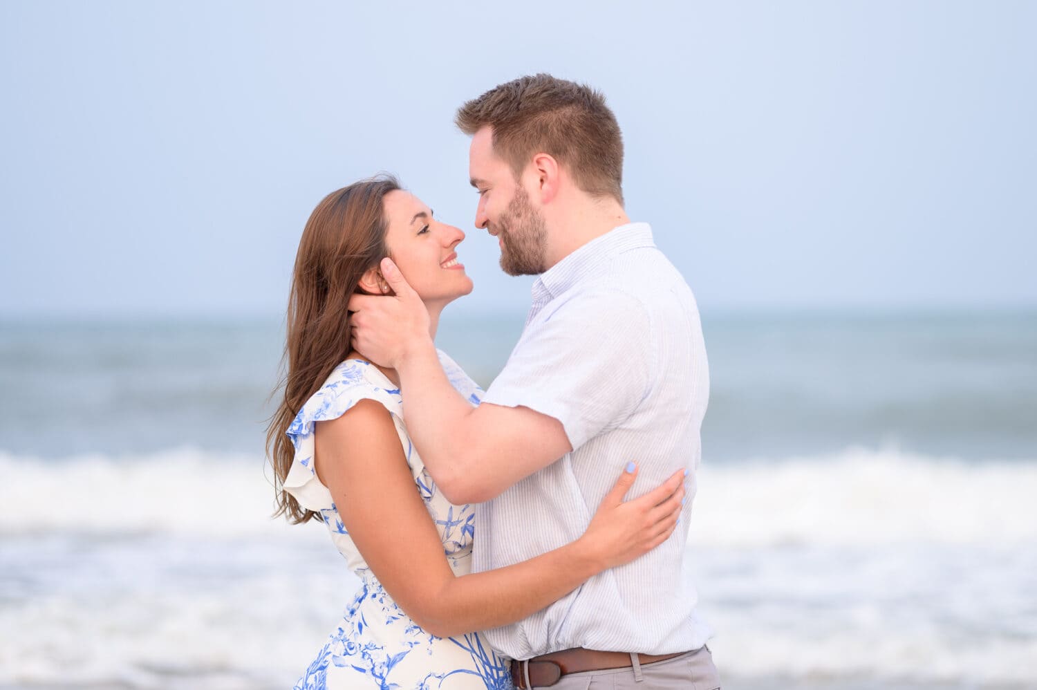 Engagement portraits on the beach and around the Atalaya Castle - Huntington Beach State Park