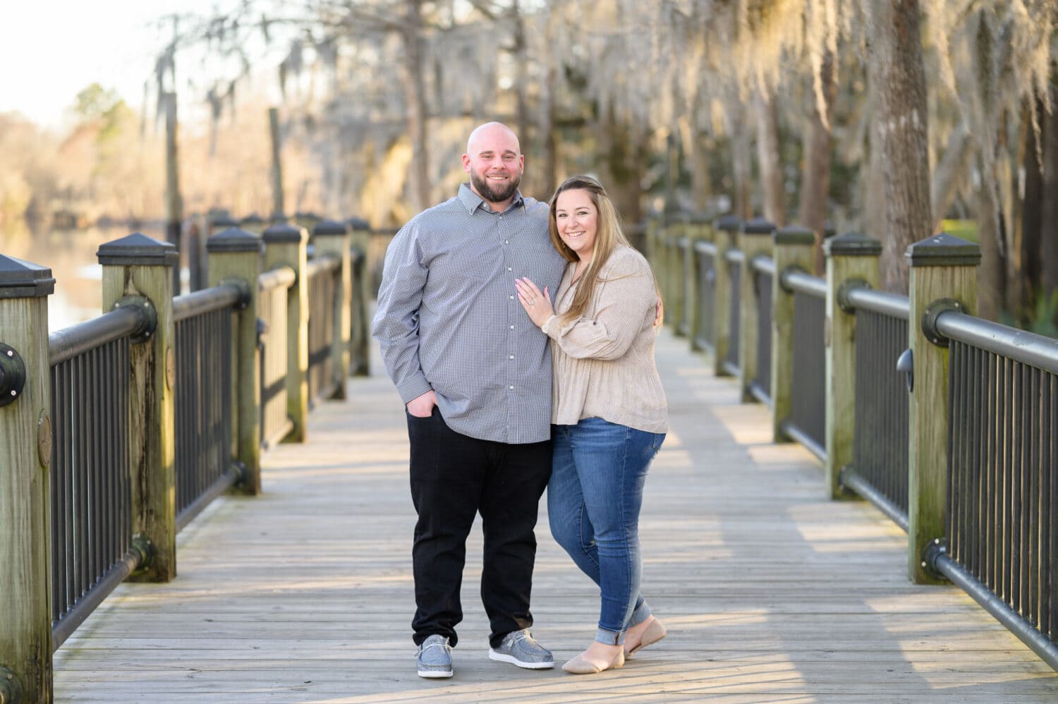 Happy couple after a surprise January proposal - Conway Riverwalk
