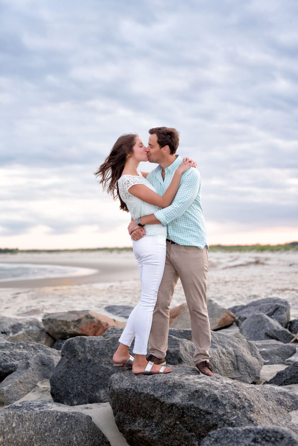 Kiss on the jetty with an unusually pretty sunset  in Garden City - Murrells Inlet
