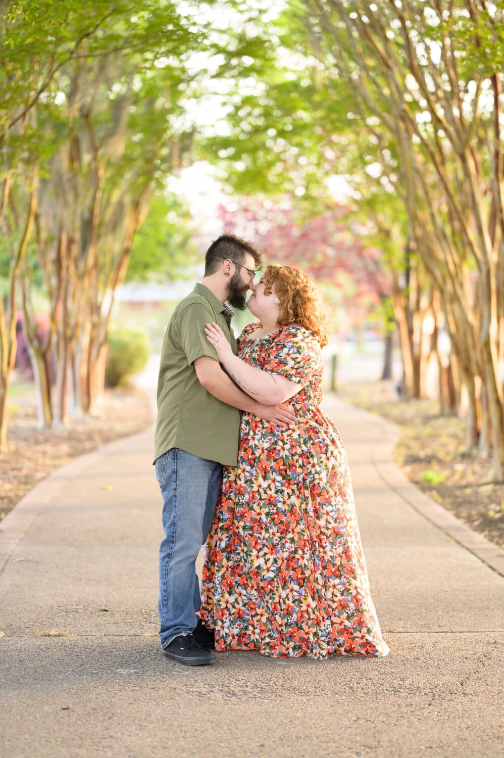 Kiss under the trees - Conway Riverwalk