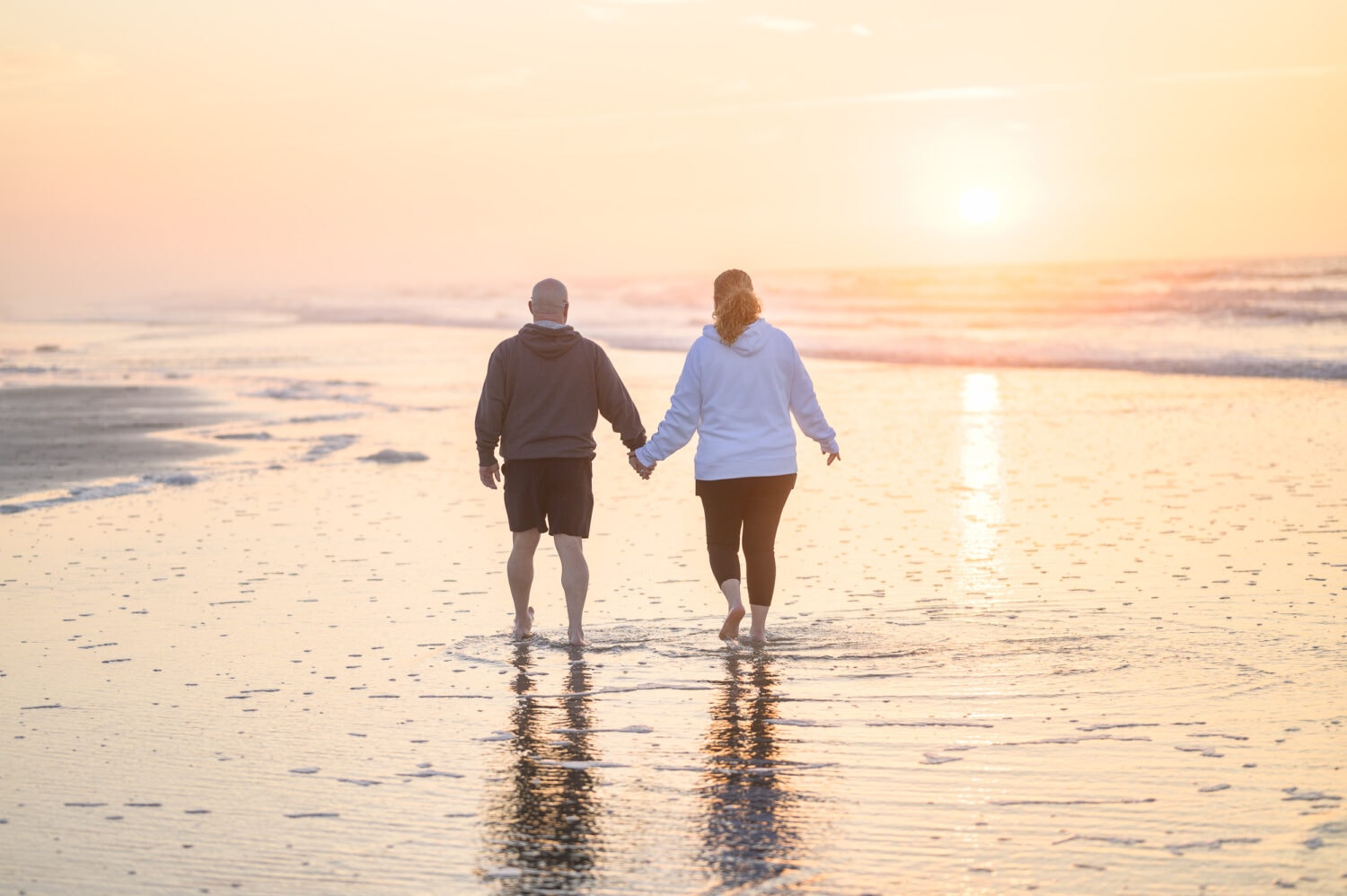 Older couple sunrise engagement pictures - Ocean Isle