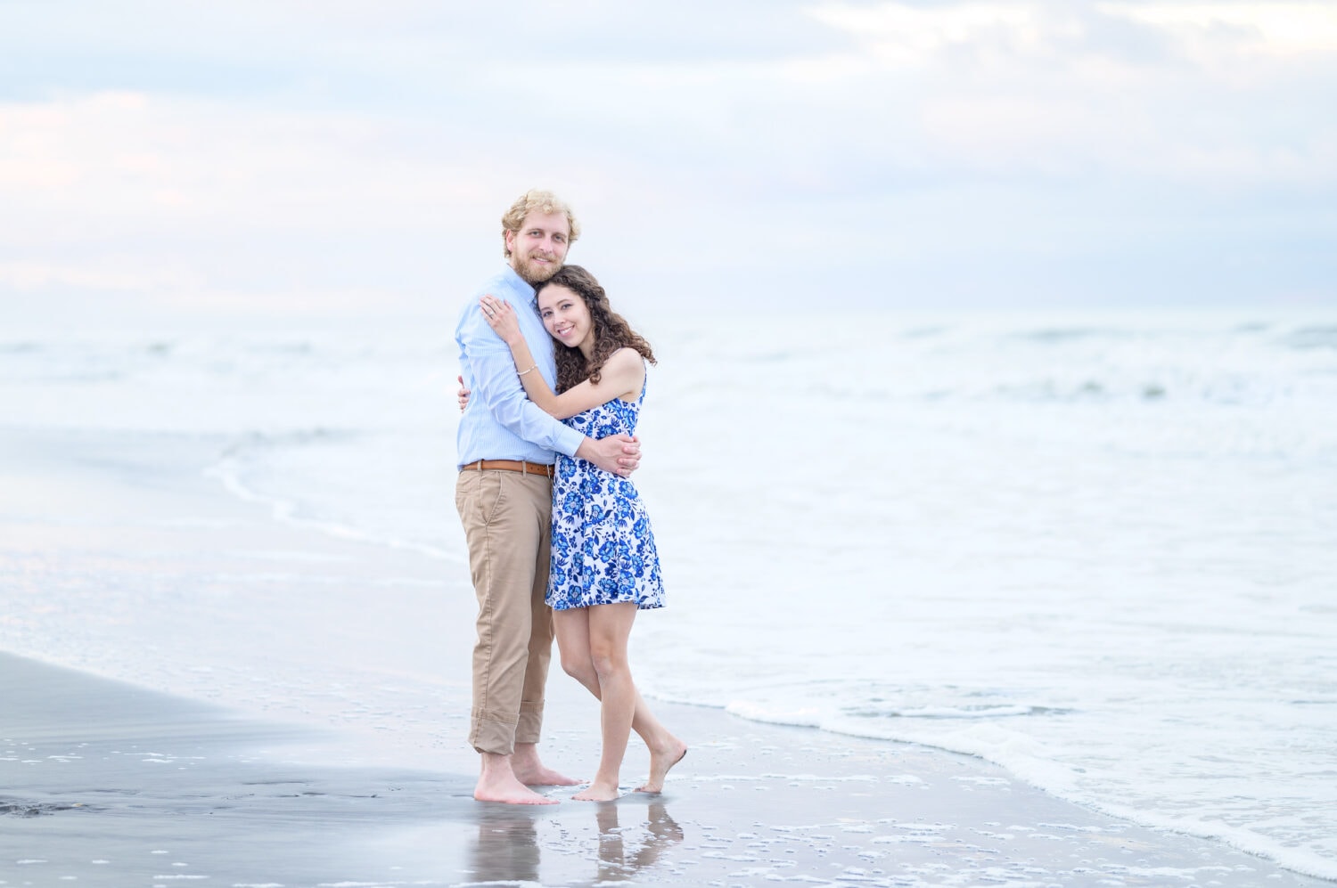 Overcast day for a happy couple on the beach - Huntington Beach State Park