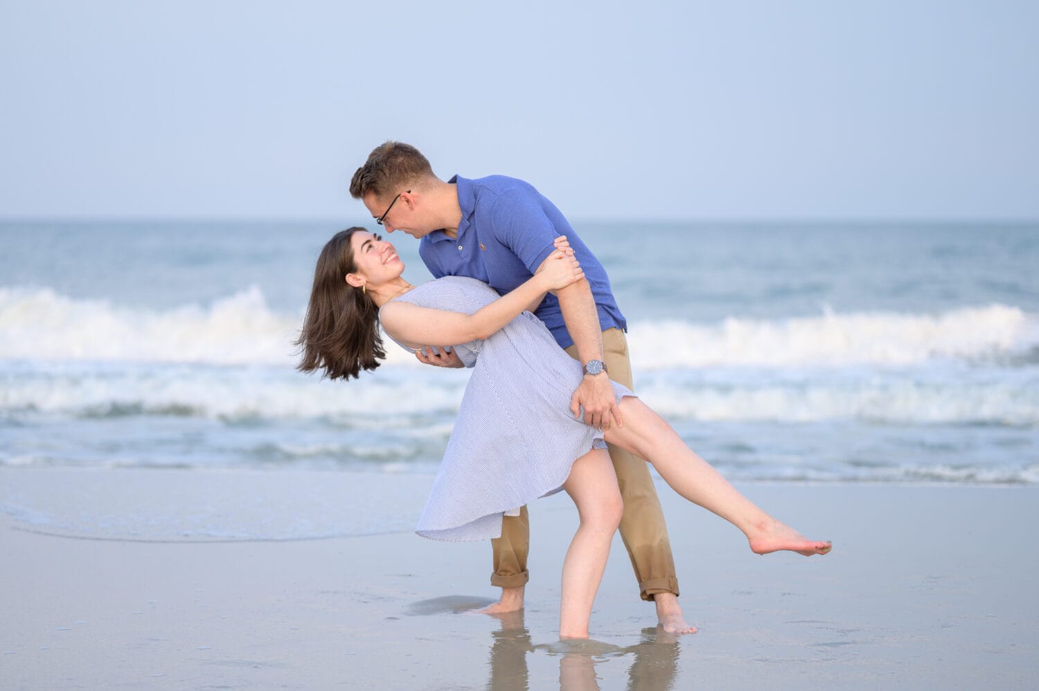 Summer surprise proposal with a beautiful sunset by the ocean - Huntington Beach State Park