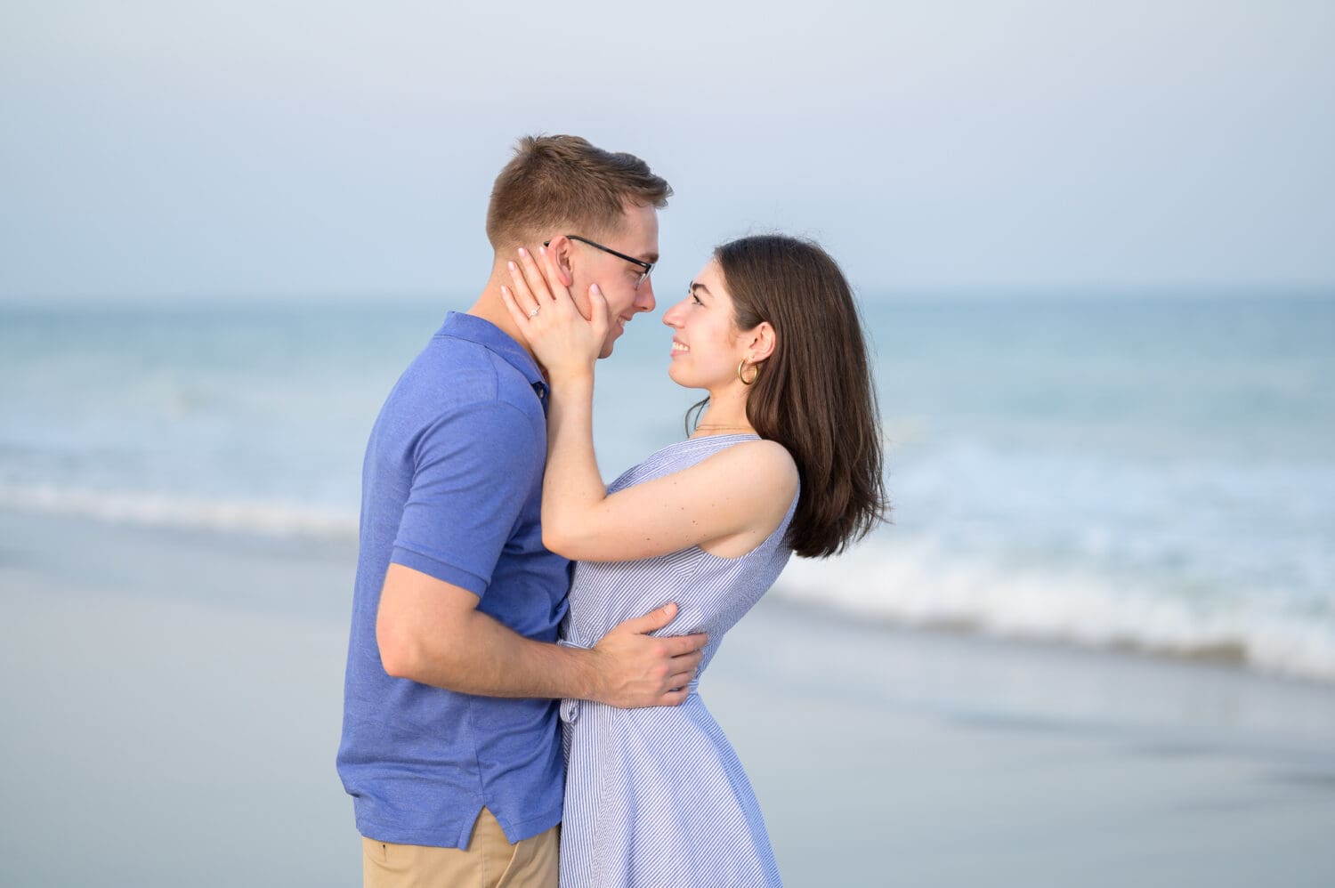 Summer surprise proposal with a beautiful sunset by the ocean - Huntington Beach State Park