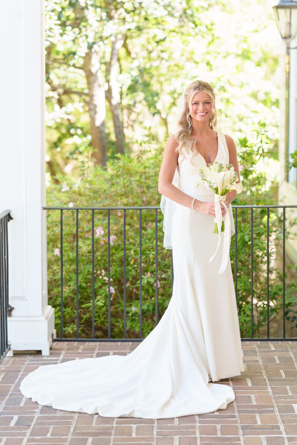 Bride outside the doors of the clubhouse - Pawleys Plantation