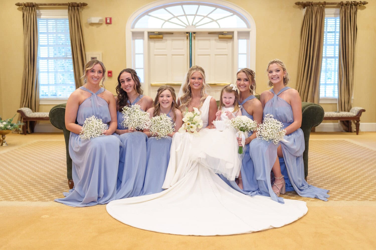 Bridesmaids sitting on the couch - Pawleys Plantation