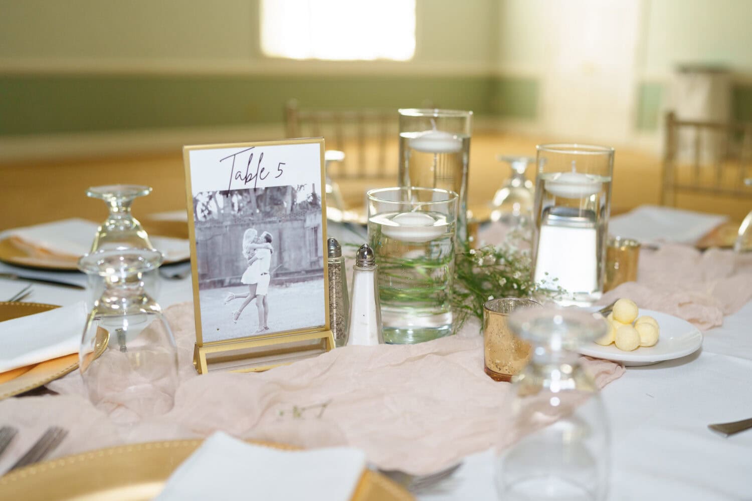 My engagement pictures decorating the tables - Pawleys Plantation