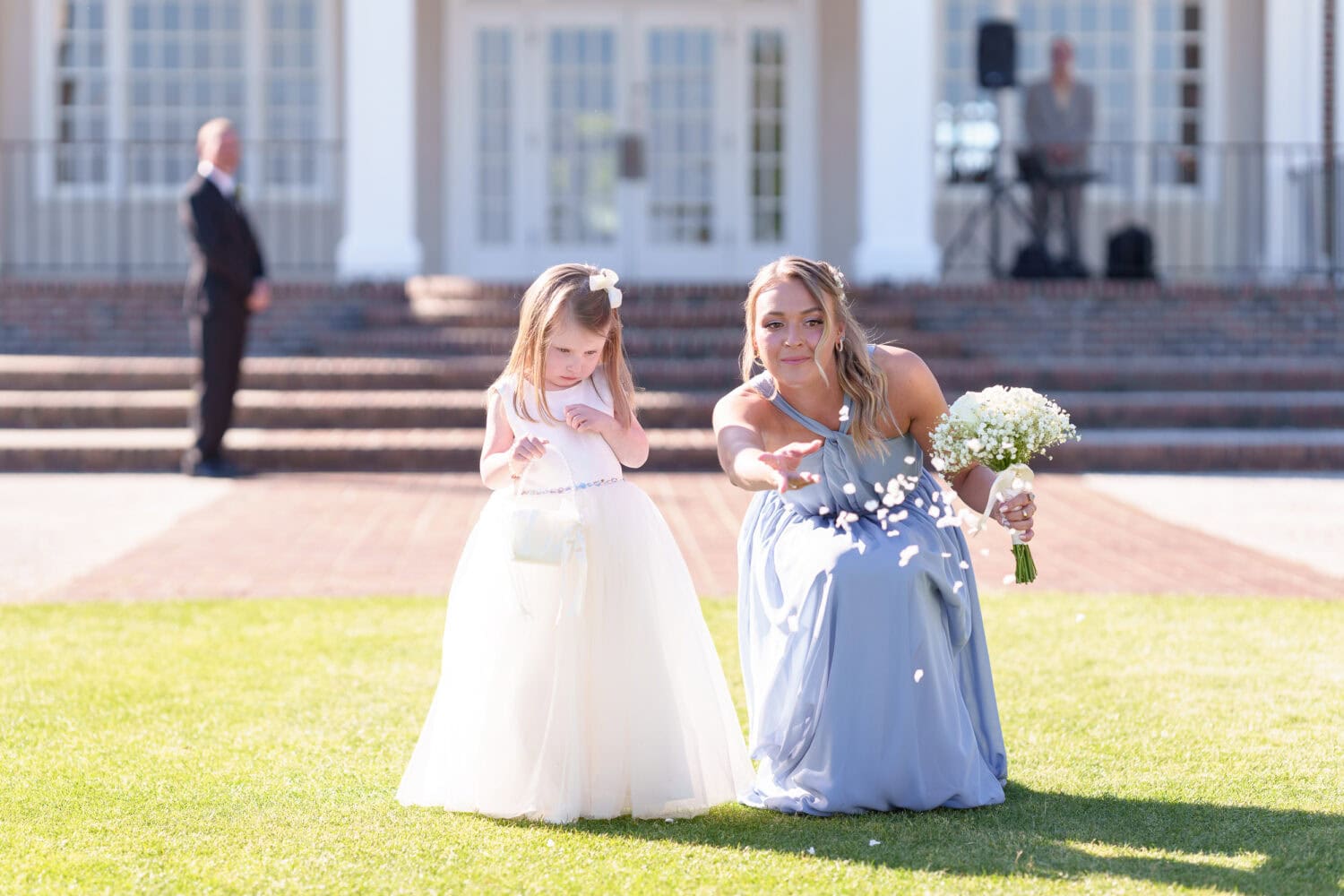 Trying to get flowergirl to throw the flowers - Pawleys Plantation