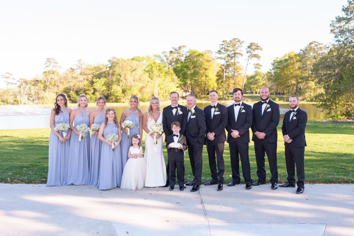 Wedding party in the shade by the lake - Pawleys Plantation