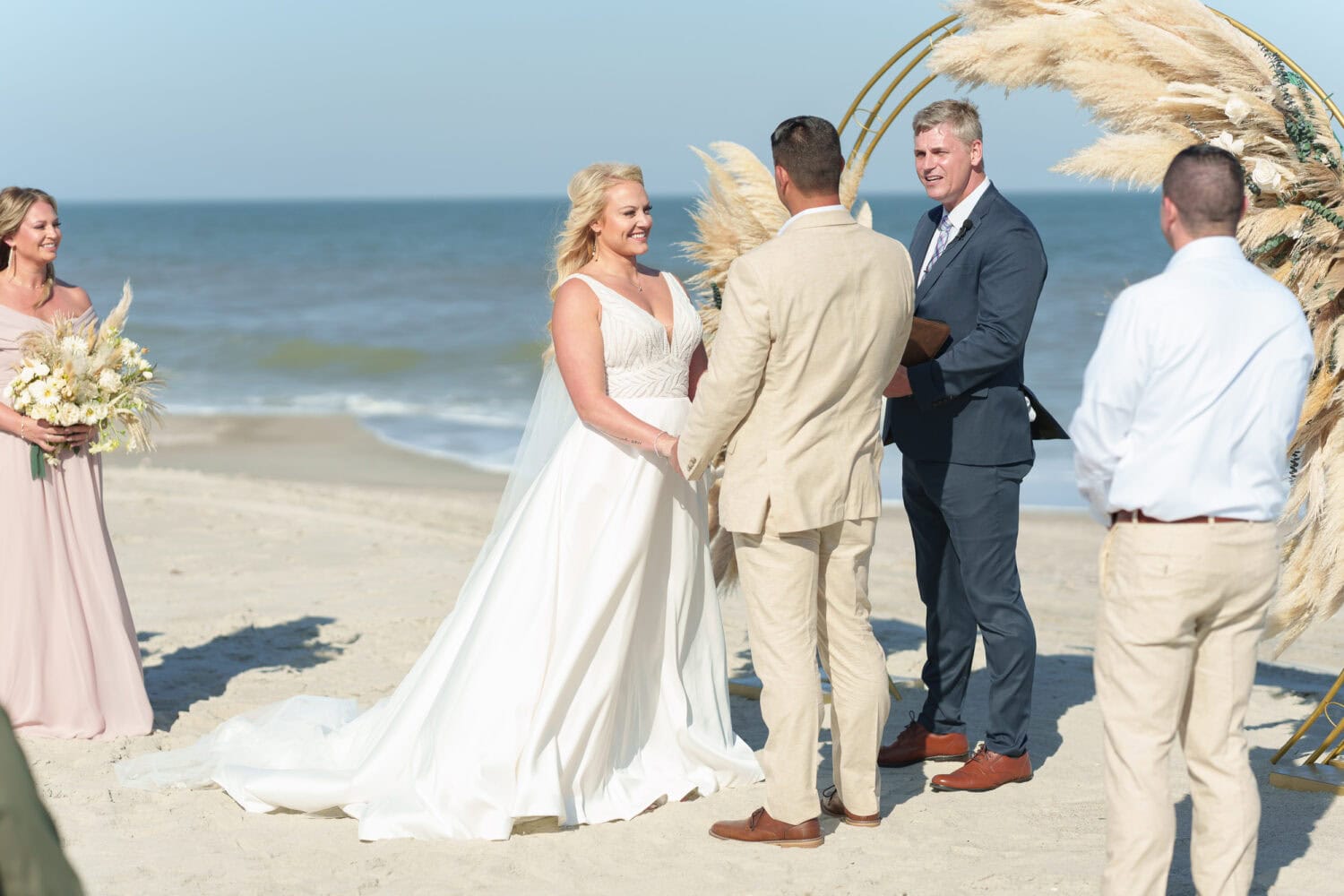 Big smiles during the vows - Beach House in Pawleys Island