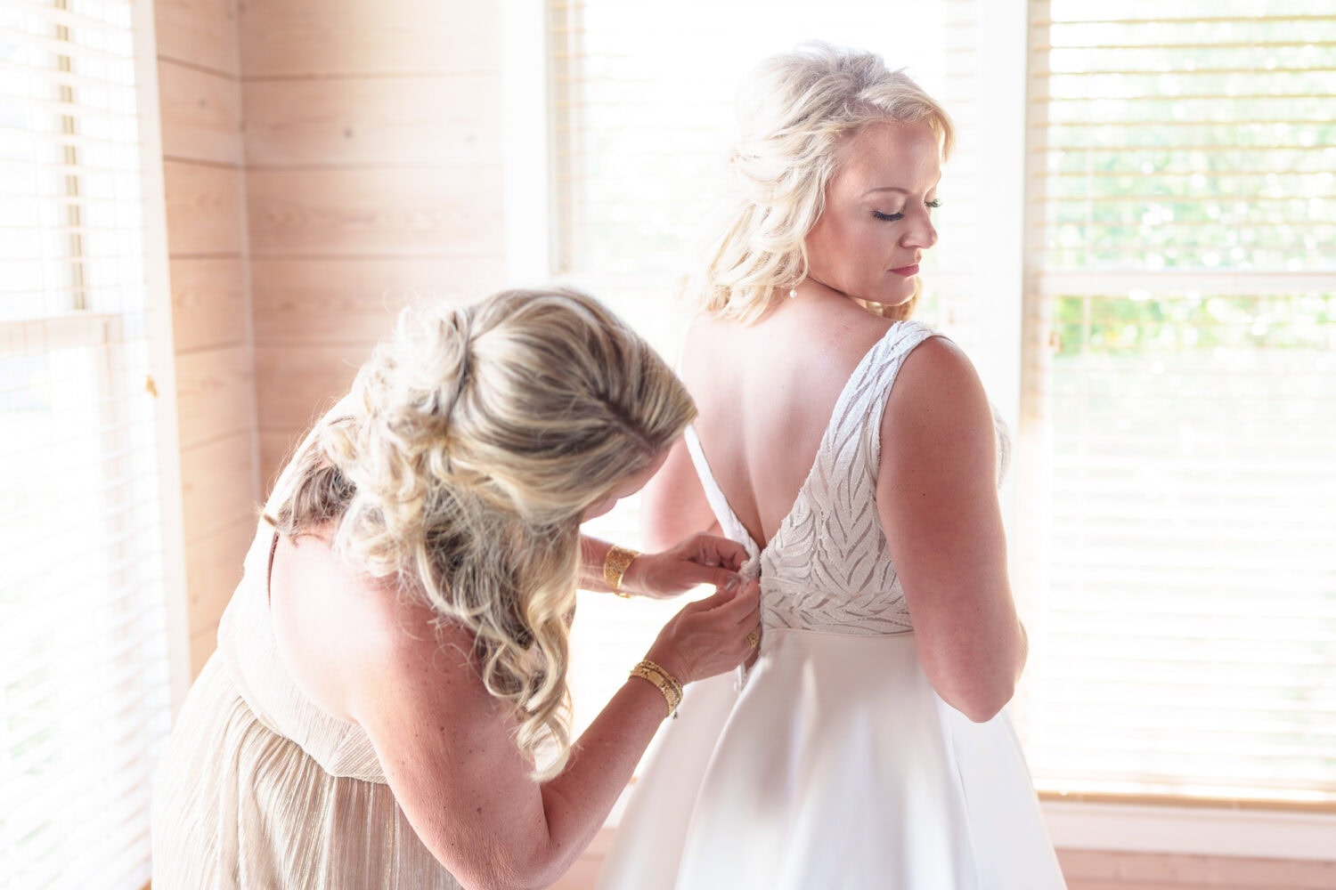 Mom helping bride with her dress - Beach House in Pawleys Island