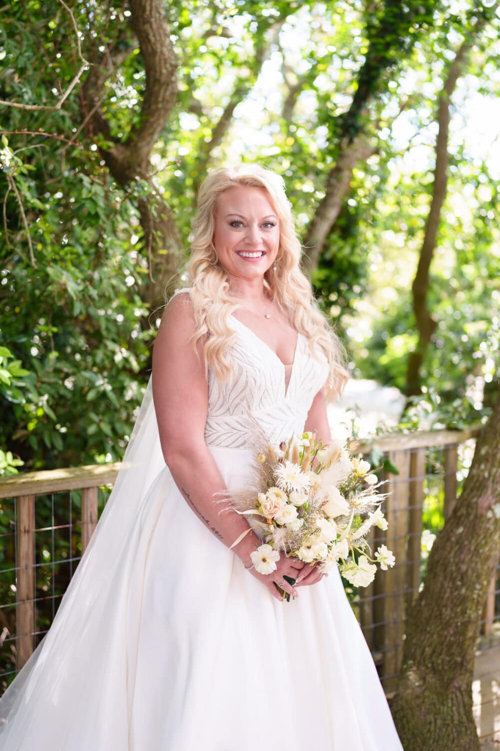 Portraits of the bride by the foliage around the beach house - Beach House in Pawleys Island