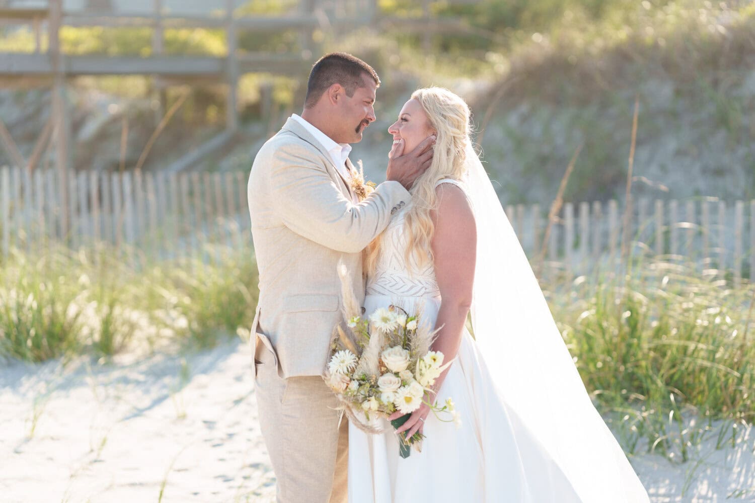 Pulling bride in for a kiss - Beach House in Pawleys Island